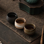 Wabi-Sabi Handcrafted Stoneware Tea Cup: Artisanal Earth-Toned Tasting Cup